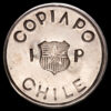 Chile – Copiapó. 1 Peso. (21,51g.). Chile. 1865. KR-4. EBC. Emitida durante el bloqueo del Puerto de Caldera.