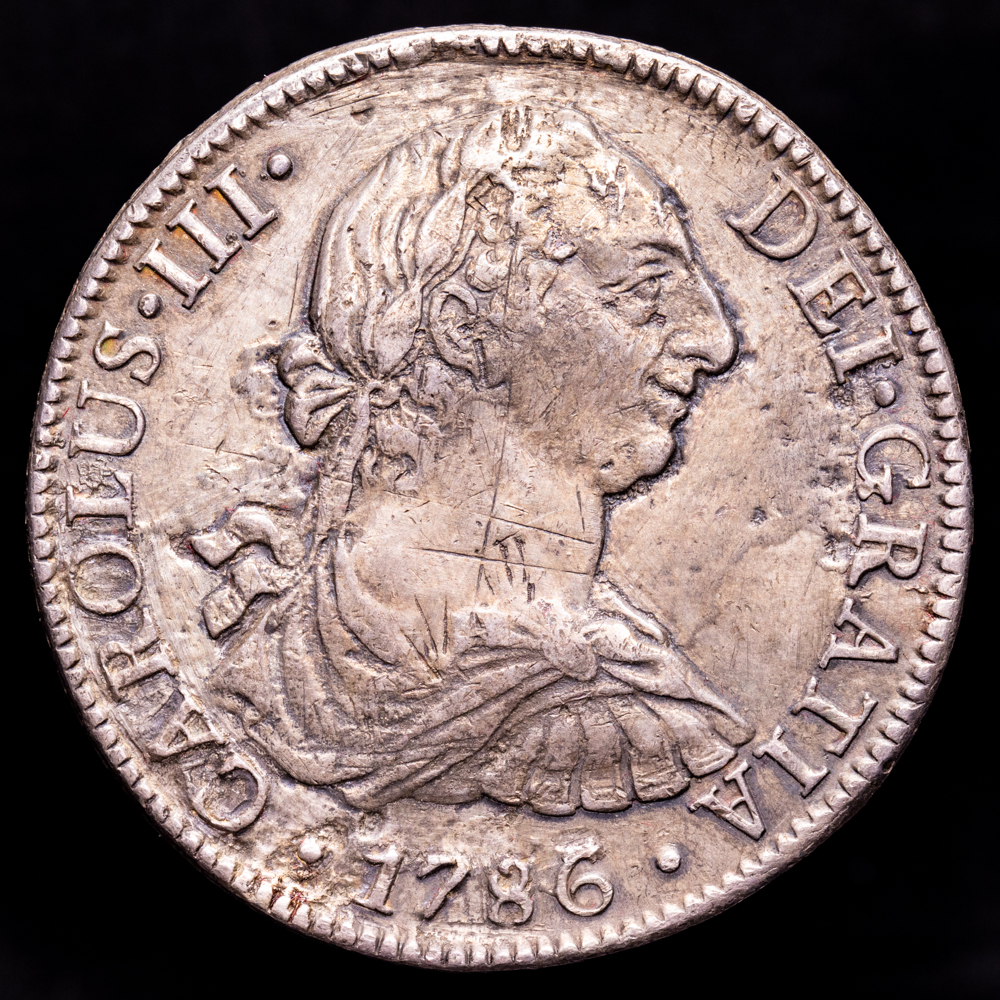 Carlos III. 8 Reales. (26,87 g.). México. 1786. Ensayador F·M. AC-1129. MBC+. Grafiti en anverso y restos de soldadura