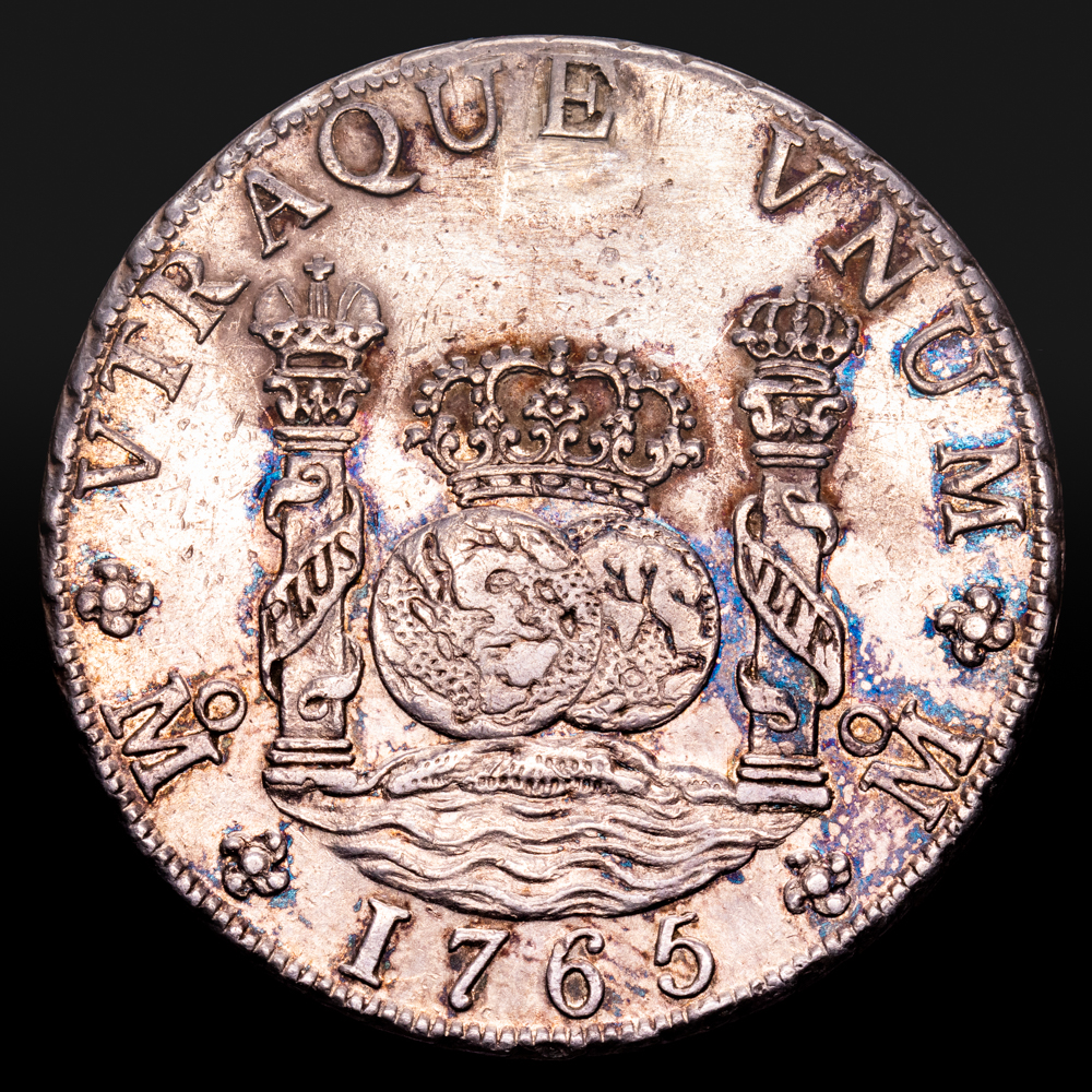 Carlos III. 8 Reales. (26,91 g.). México. 1765. Ensayador M·F. AC-1088. EBC. Agujero expertamente reparado.