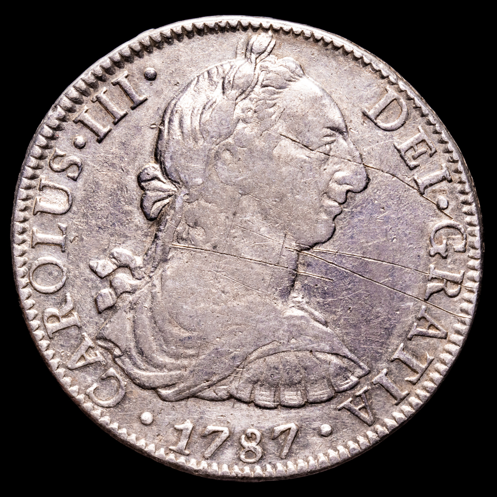 Carlos III. 8 Reales. (26,79 g.). México. 1787. Ensayador F·M. AC-1131. MBC. Restos de brillo original. Rayas en anverso.