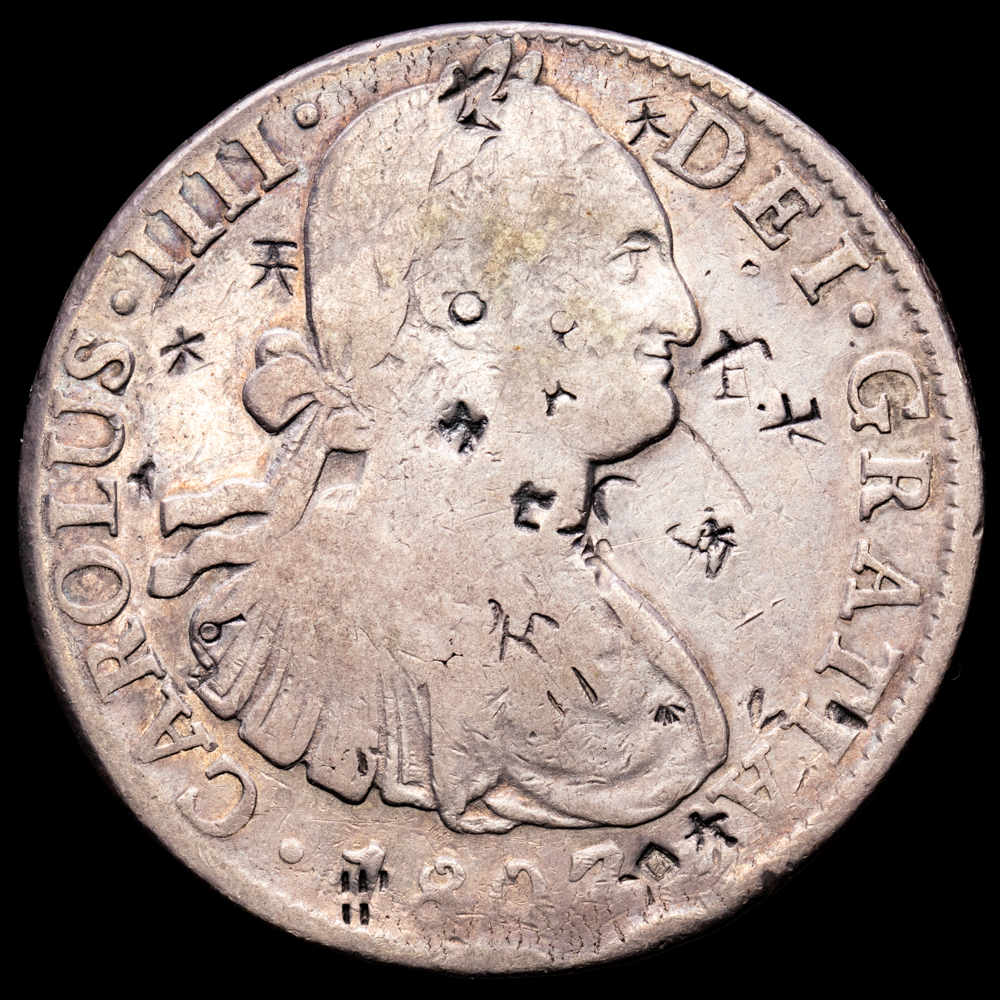 Carlos IV. 8 Reales. (26,73 g.). México. 1803. Ensayador T·H. Aureo y Calicó 978. MBC. Resellos chinos.
