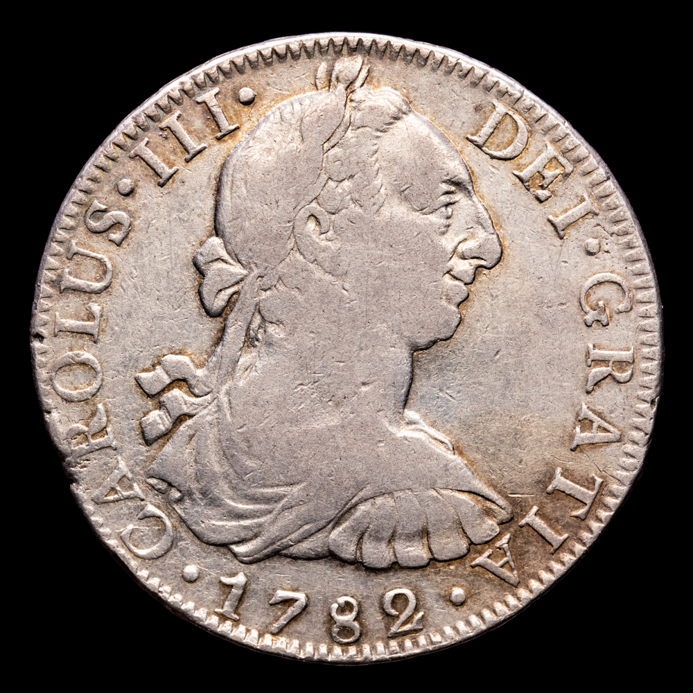 Carlos III. 8 Reales. (26,68 g.). México. 1782. Ensayador F·F. Aureo y Calicó – 1112. MBC+. Pátina. Pequeños golpecitos.