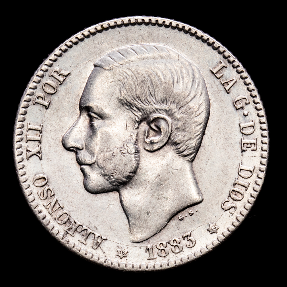 Alfonso XII. 1 Peseta. (4,96 g.). Madrid. 1883 *18-83*. Ensayador MS-M. Aureo y Calicó – 21. MBC+.