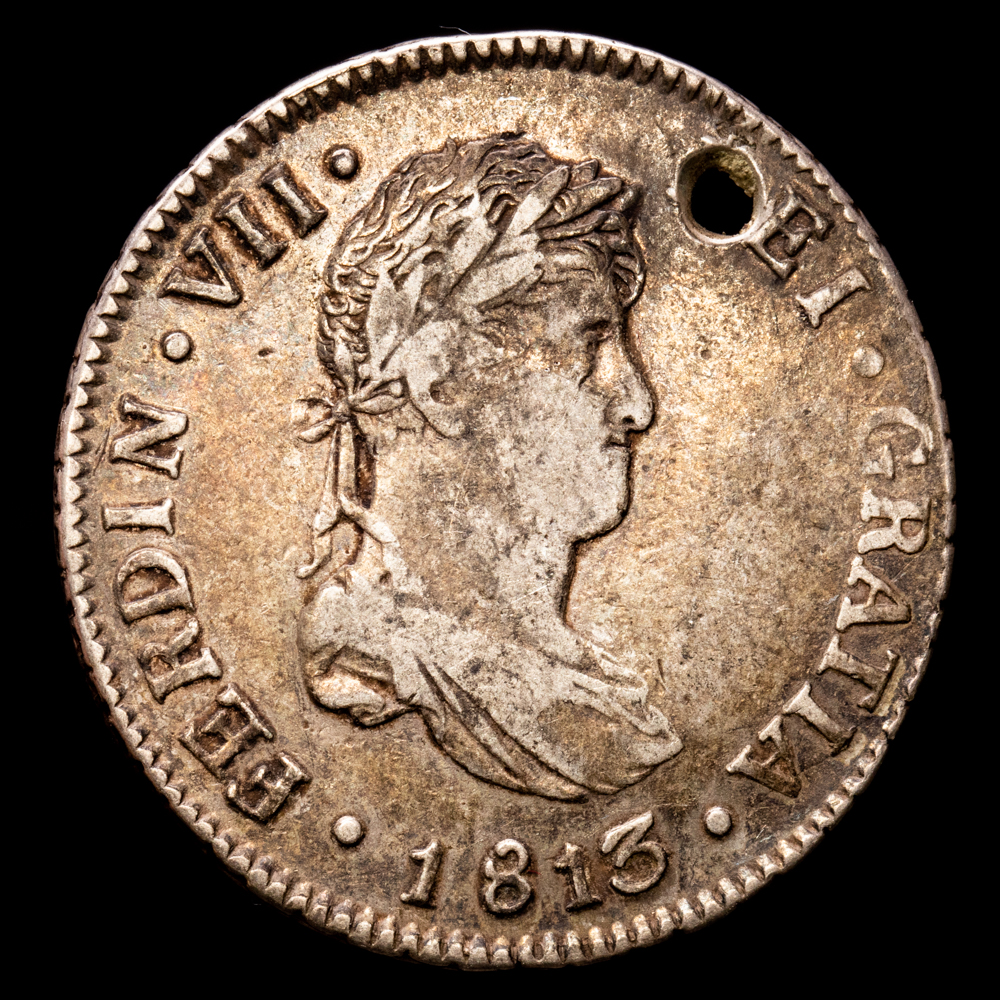 Fernando VII. 2 Reales. (6.46 g.). Nueva Guatemala. 1813. Ensayador (M). Aureo y Calicó-796. (MBC+). Escasa. Agujero a la 1H