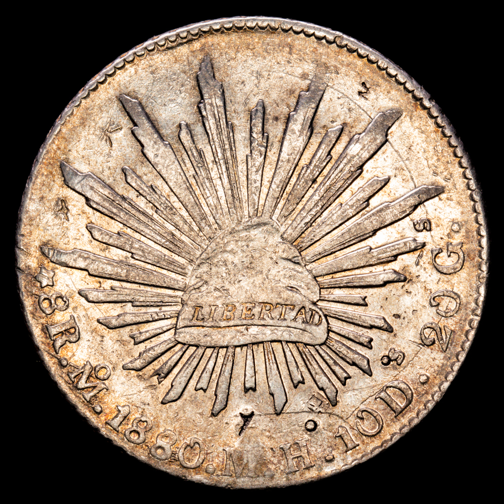 República de México. 8 Reales. (26,98 g.). México. 1880. Ensayador M·H. KM-377.12. VF+. Resellos orientales. Rayitas en reverso