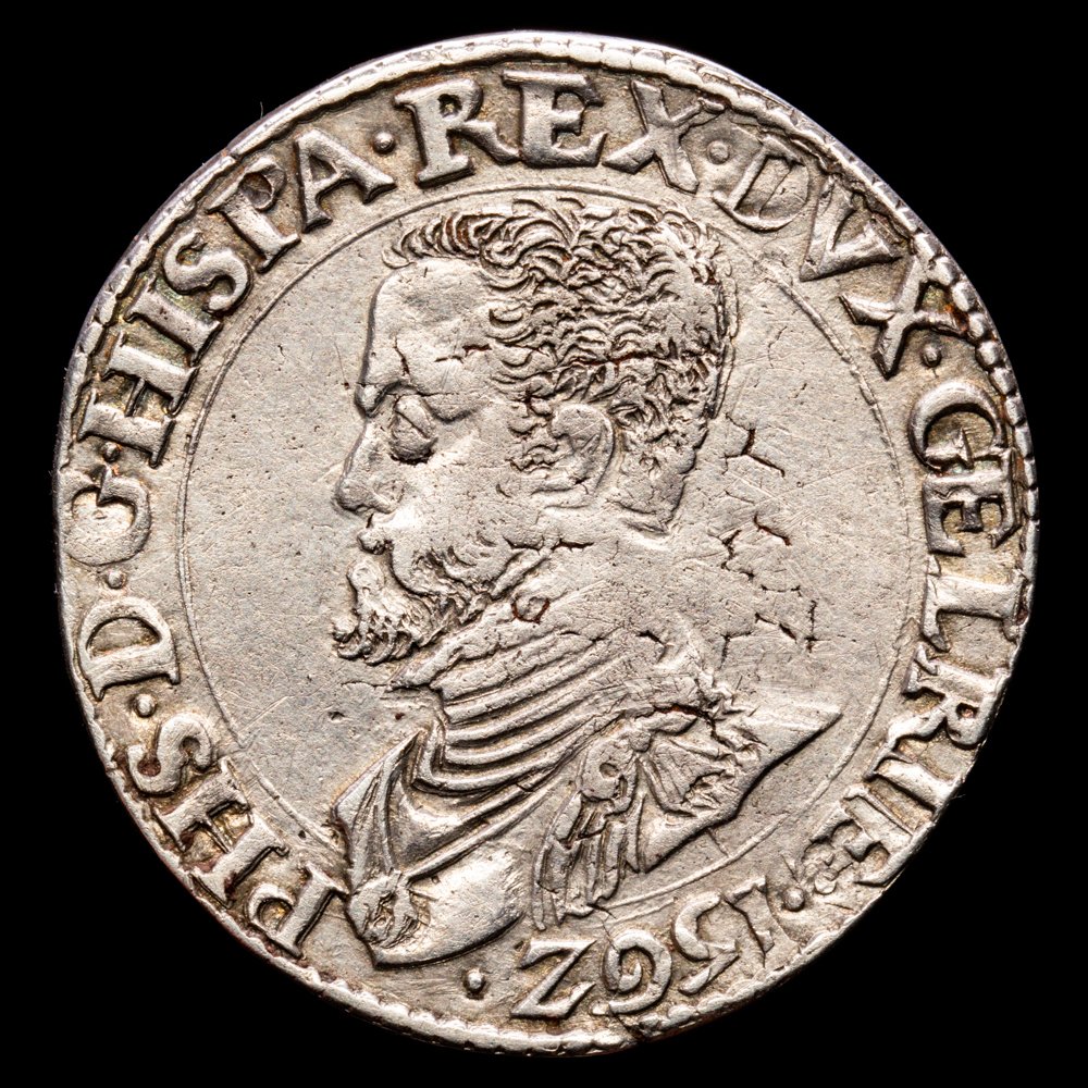 Felipe II. 1/2 Escudo. (14.89 g.). Gueldres. 1562. VTI-993. MBC+. Rara. Fecha en posición invertida