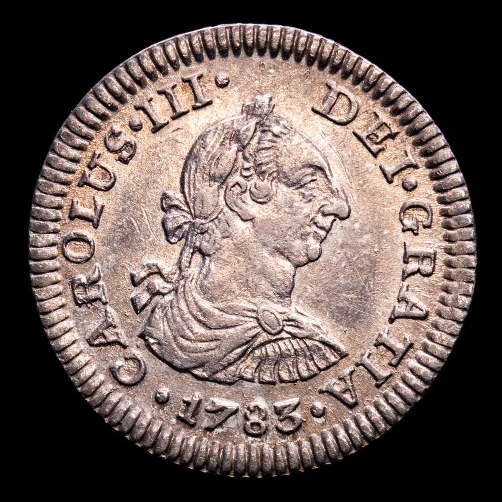 Carlos III. 1/2 Real. (1,59 g.). México. 1773. Ensayadores F·F. Aureo y Calico-1775. EBC+. Restos de brillo original. Pátina