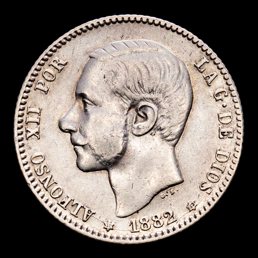 Alfonso XII. 1 Peseta. (5,01 g.). Madrid. 1882 *18-82*. Ensayador MS-M. Aureo y Calicó – 20. MBC+. Escasa