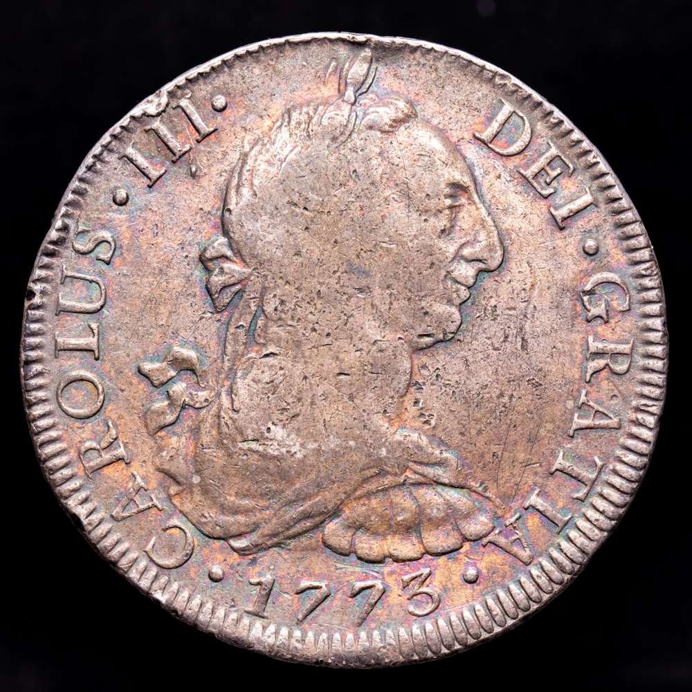 Carlos III. 8 Reales. (26,73 g.). México. 1773. Ensayador F·M. AC-1107. MBC-. Bella pátina iridiscente.
