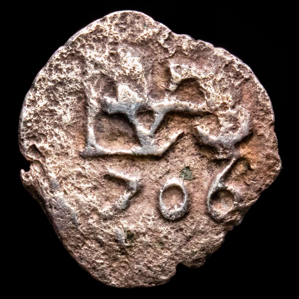 Felipe V. 1/2 Real. (0,71 g.). Lima. 1706. Aureo y Calicó-135. BC+. Escasa. Oxidaciones marinas
