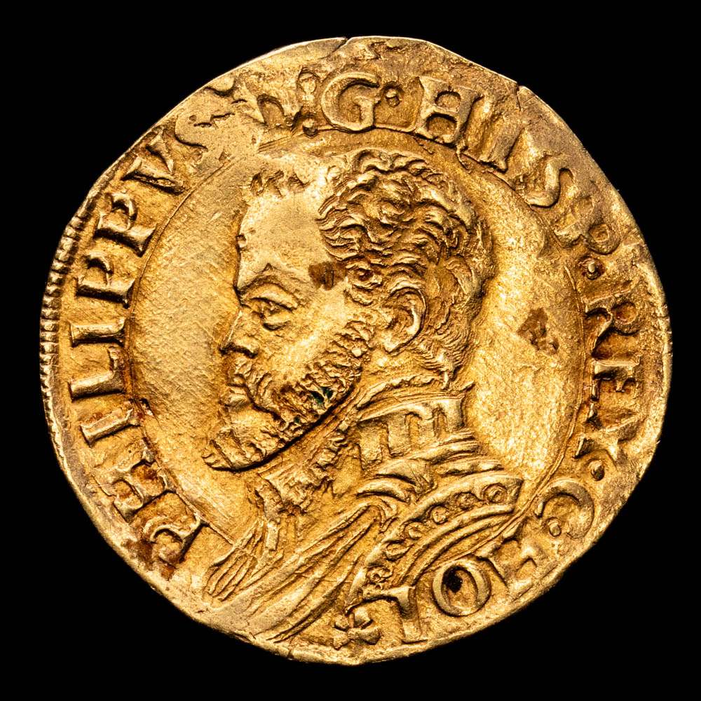 Felipe II (1556-1598). 1/2 real de oro. Sin fecha. Dordrecht. (Vti-1393). (Vanhoudt-262). Au. 3,47 g. Rara. MBC+.