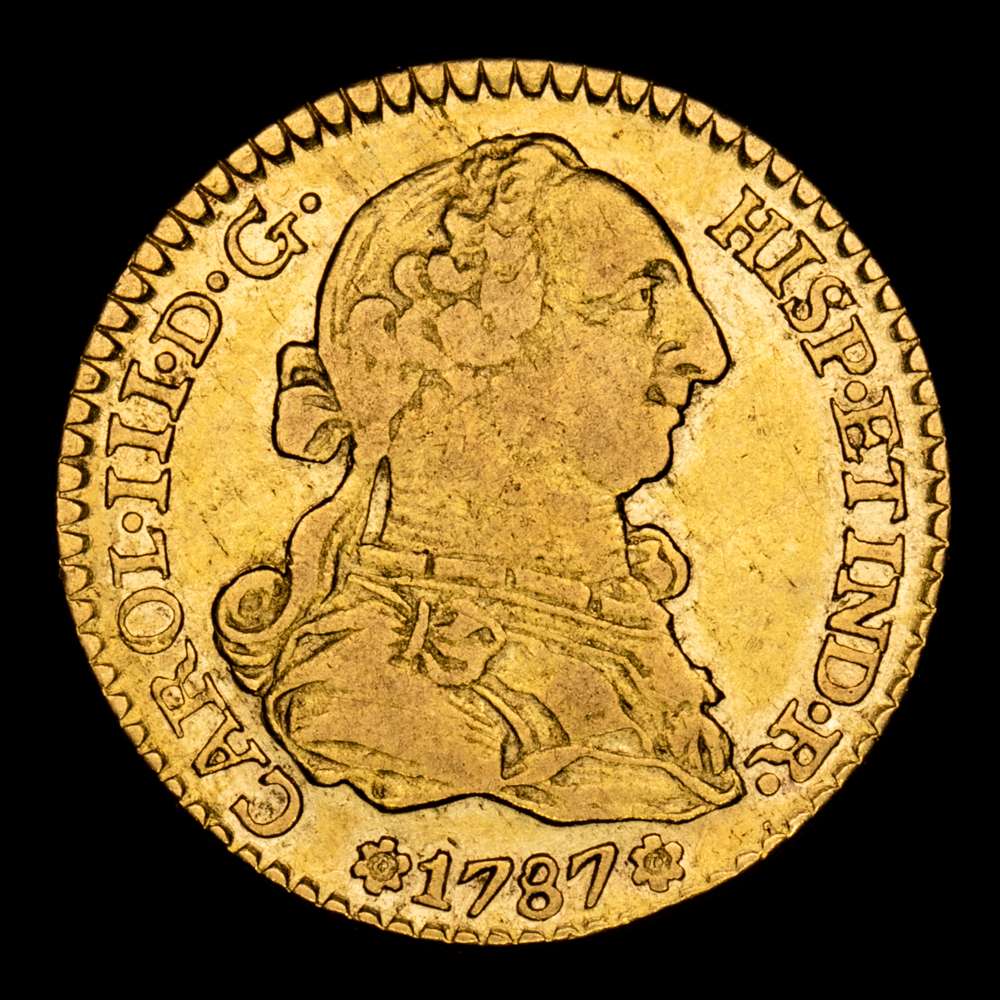 Carlos III. 1 Escudo. (3,34 g.). Sevilla. 1787. Ensyador C·M. Aureo y Calico-1505. MBC+/EBC. Restos de brillo original.