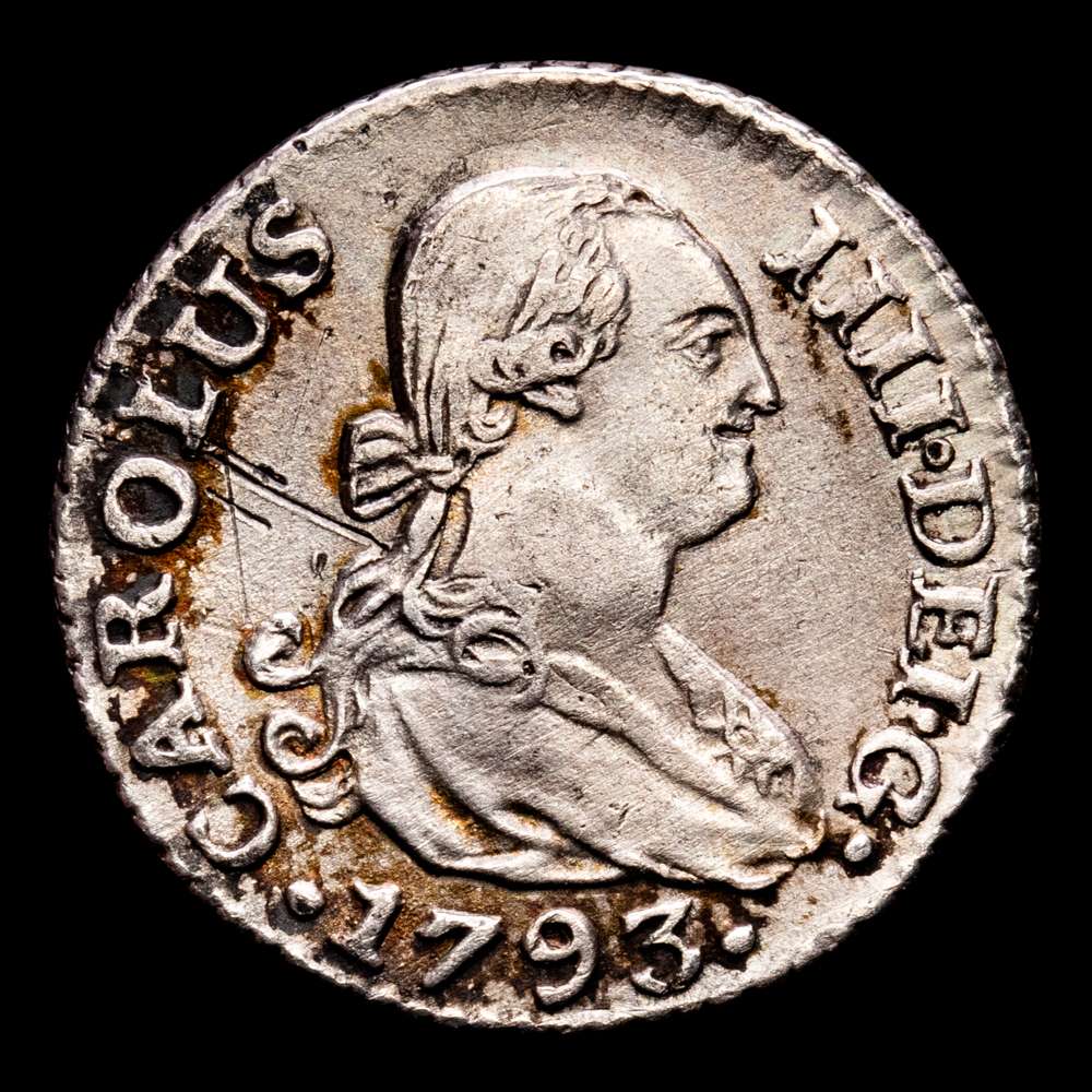 Carlos IV. 1/2 Real. (1,49 g.). Madrid. 1793. Ensayador C·N. Aureo y Calico-359. MBC+. Escasa. Rayitas