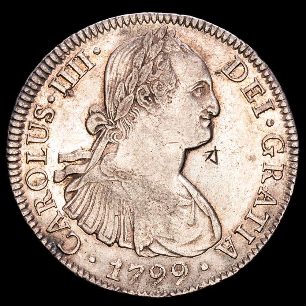 Carlos IV. 8 Reales (27,02 g.). México. 1799. Ensayador F·M. AC-963. MBC+. Resellos chinos. Restos de brillo original.