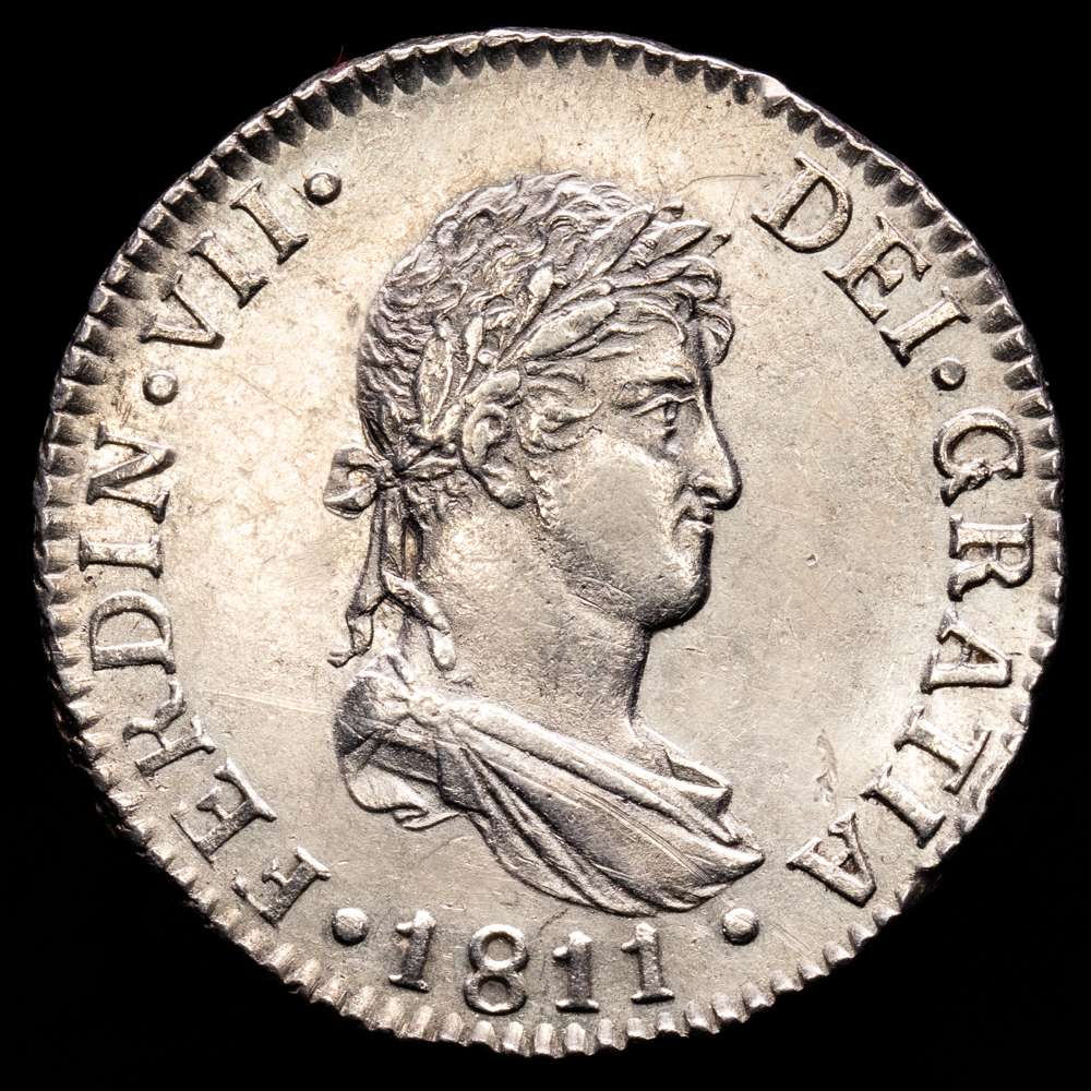 Fernando VII (1808-1833). 2 reales. 1811. Cádiz. CI. (Cal-726). Ag. 5,91 gramos. Marca de ceca grande. Rara en esta conservación. EBC.