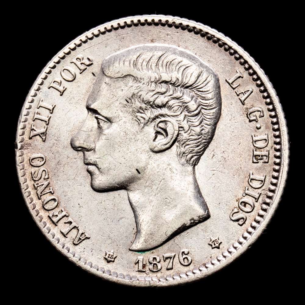 Alfonso XII. 1 Peseta. (4,91 g.). Madrid. 1876 *18-76*. Ensayador DE-M. Aureo y Calicó – 15. EBC-/MBC+. Escasa