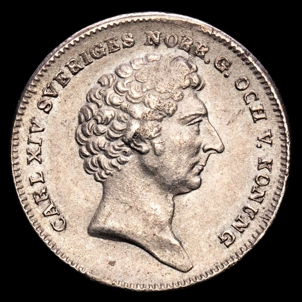 Suecia – Carlos XIV Juan 1818-1844. 1/8 Riksdaler Especie 1834 . Escudo de armas y cadena de órdenes en círculo. AAH 87. (4,19 gramos). XF.