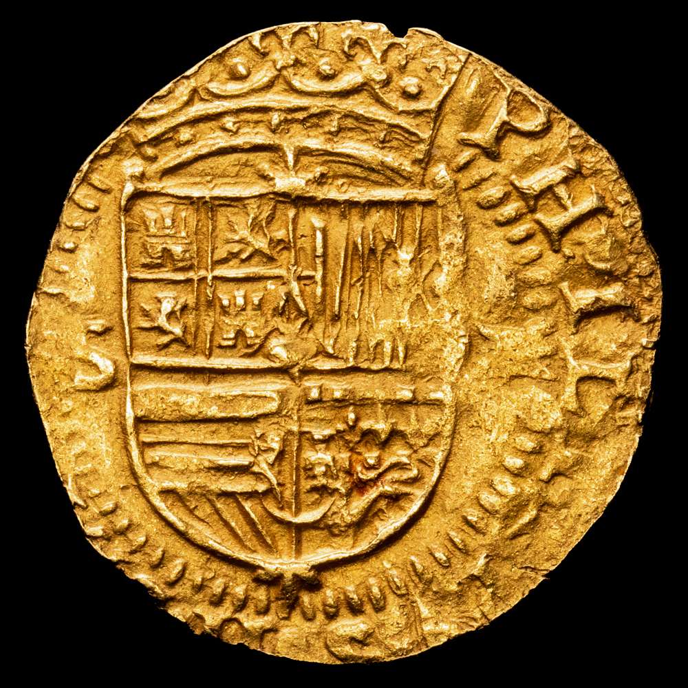 Felipe II. 1 Escudo. (3,33 g.). Sevilla. (1556-1598). “Escudo entre “S y D cuadrada”. AC-784. MBC+. Atractiva. Visible el nombre y el ordinal del rey completo.