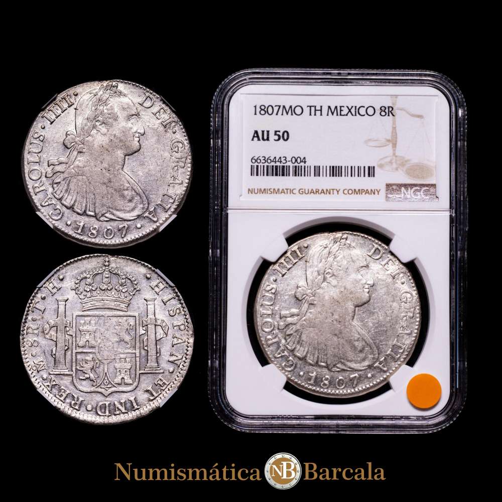 México Colonia española 1807 Mo TH 8 Reales – Carlos IV Plata. Casa de la Moneda de la Ciudad de México. Encapsulada por NGC como AU 50 (KM 109.Cal-986).
