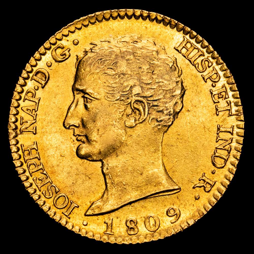 José Napoleón (1808-1814). 80 reales. 1809. Madrid. AI. (Cal-47). Au. 6,71 gramos. Busto desnudo. Primer año del tipo. Parte de brillo original. Rara. EBC+.