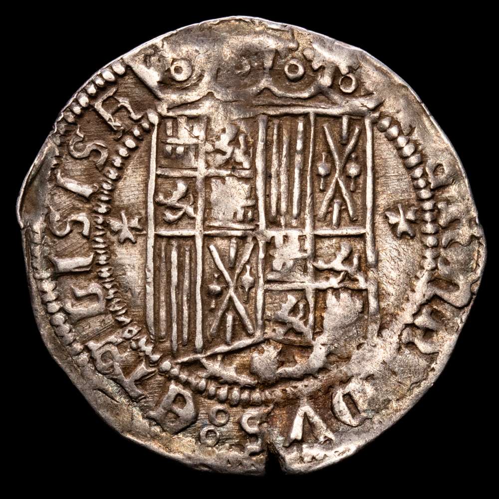 Fernando e Isabel (1474-1504). 1 real. Granada. AR 3,40 gramos. (Cal-365). Escudo entre adornos cruciformes. G debajo del yugo y las flechas. Sin nombre de los Reyes. Ecasa. MBC.