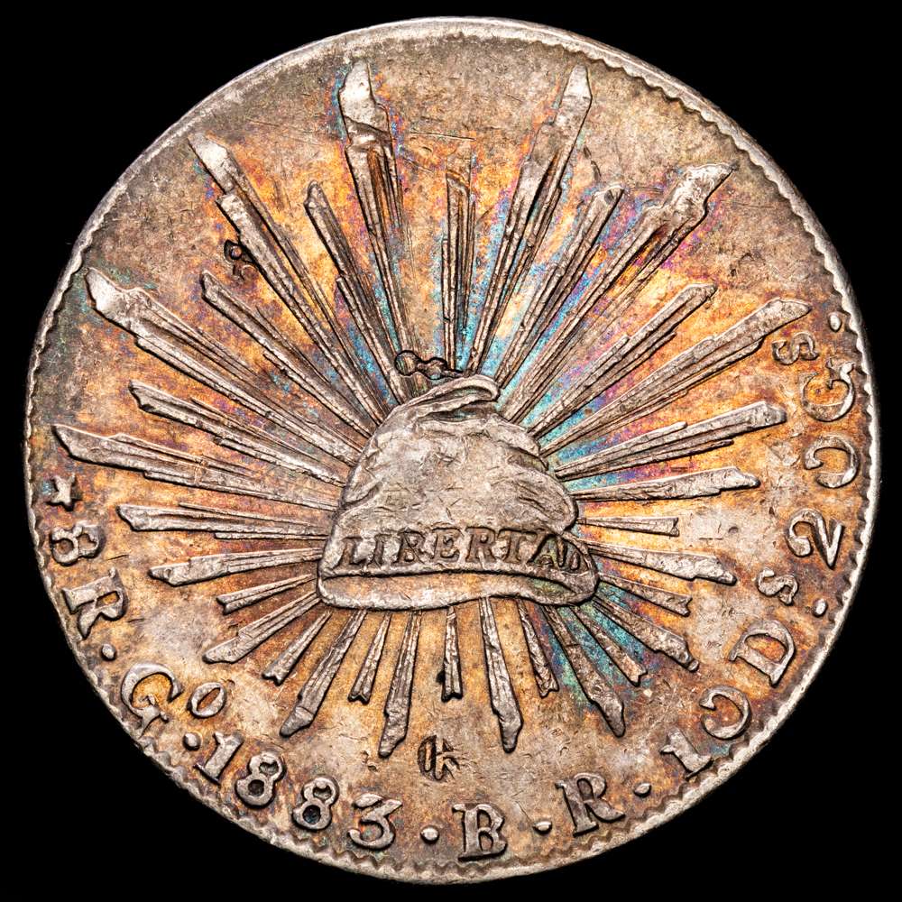 República de México. 8 Reales. (27,09 g.). Guanajuato. 1883. B·R. KM-377.8. Resellos orientales. Bello color irisado. XF.