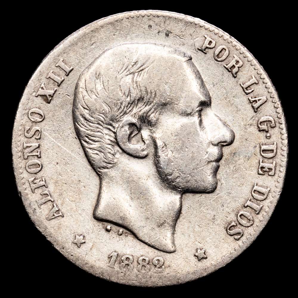 Centenario de la Peseta (1868-1931). Alfonso XII (1874-1885). 20 centavos. 1882. Manila. (Cal-107). Ag. 4,86 g. MBC-.