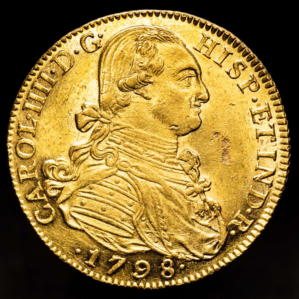 CARLOS IV (1788-1808). 8 escudos. 1798. Santa Fe de Nuevo Reino. J.J. AU 27,06 g. 36 mm.(AC. 1731) (Cal.Onza 1131) (Restrepo 97-18).  Restos de brillo original. EBC. Rara así.