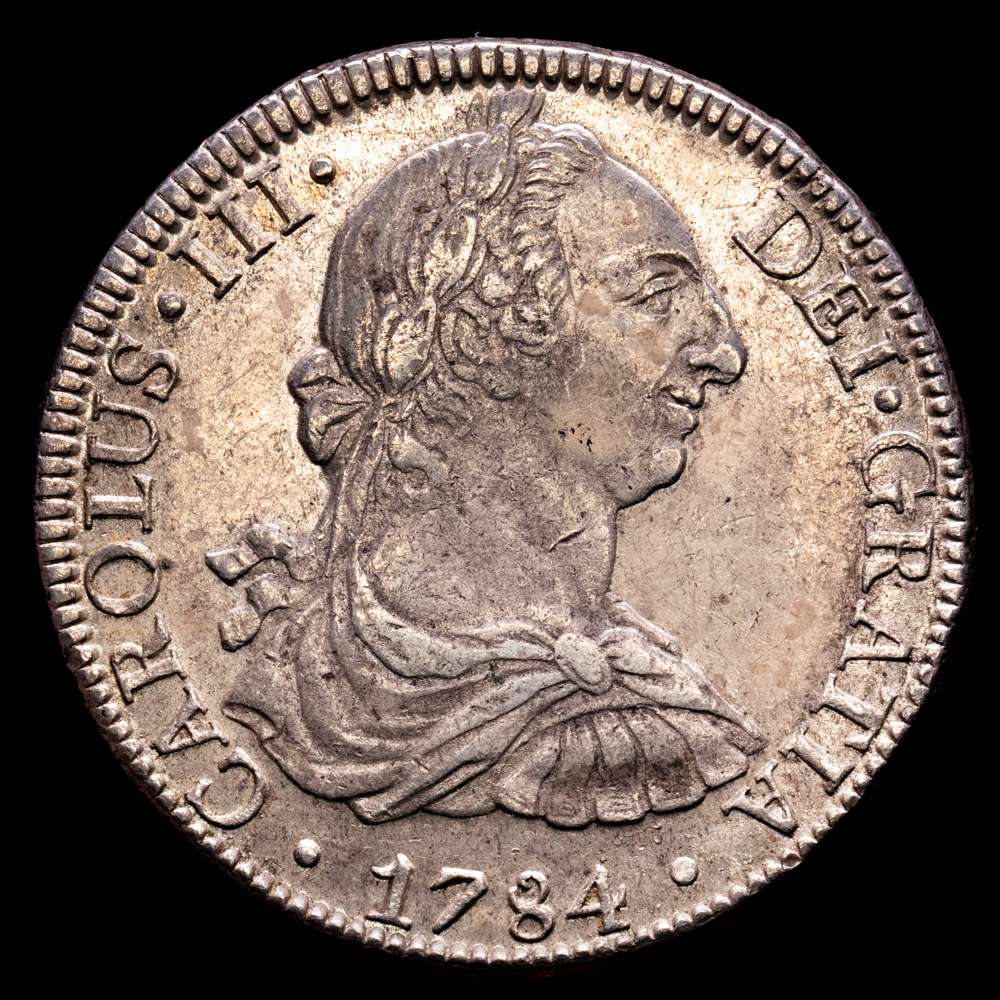 Carlos III (1759-1788). 8 reales. 1784. México. FM. (Cal-1126). Ag. 27,01 gramos. Restos de brillo originales. EBC-/EBC. Tono.