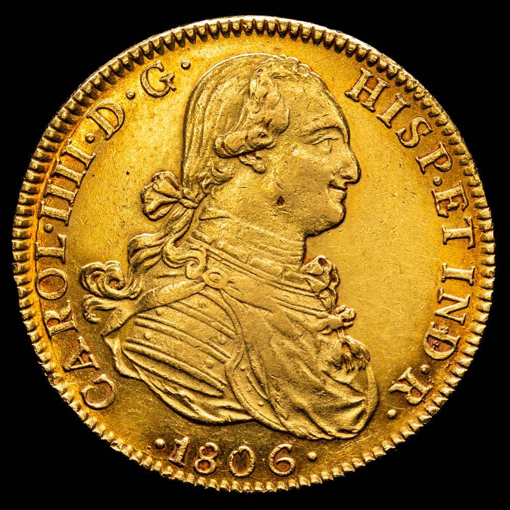 Carlos IV (1788-1808). 8 escudos. 1806. México. TH. (Cal-1651). (Cal onza-1042). Au. 27,01 gramos. Bonito color, mínimos restos de brillo original, algo más generosos en el reverso. EBC.