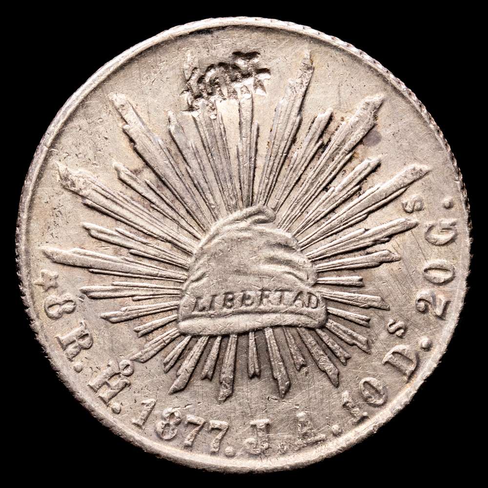 República de México. 8 Reales. (26,48 g.). Hermosillo. 1877. J·A. (KM 377.9). (Resello Chino: 生活). VF. Escasa.