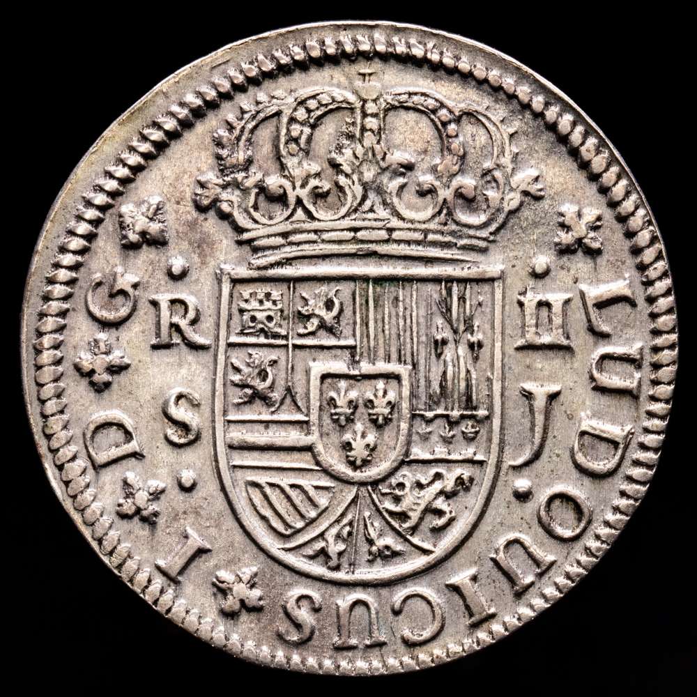 Luis I (1724). 2 reales. 1724. Sevilla. J. (Cal-29). Ag. 5,58 gramos. Ligeramente tonificado. Muy escaso. EBC-.