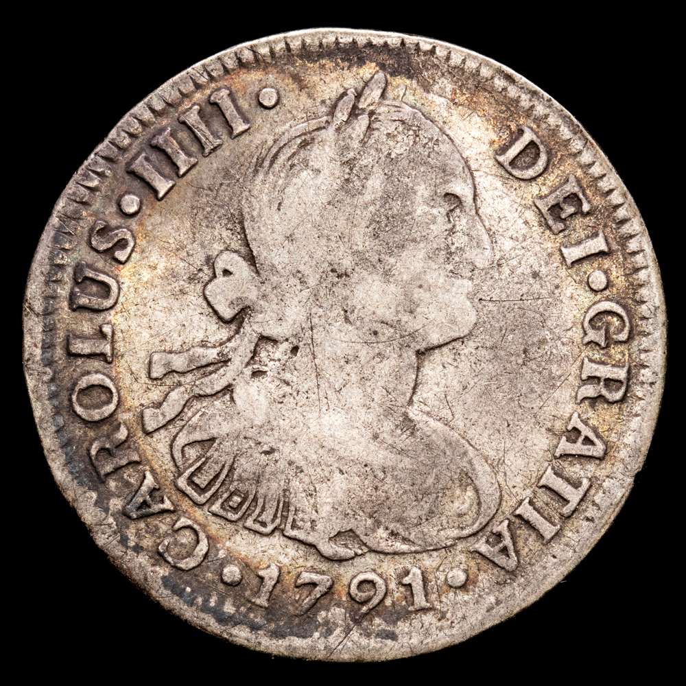 Carlos IV (1788-1808). 2 reales. 1791. Lima. IJ. (Cal-572). Ag. 6,45 gramos. Primer busto propio. Ligero tono. Rara.