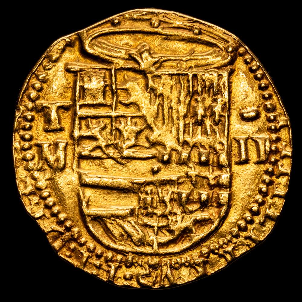 Felipe II (1556-1598). 2 escudos. Sin fecha. Toledo. M. (Cal-862 var). (Tauler-60). Au. 6,70 gramos. Sin o sobre la T a izquierda del escudo. Escasa. MBC+