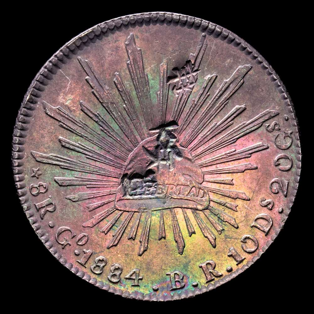 República de México. 8 Reales. (27,09 g.). Guanajuato. 1884. B·R. (KM-377.8). Resellos chinos. AU.