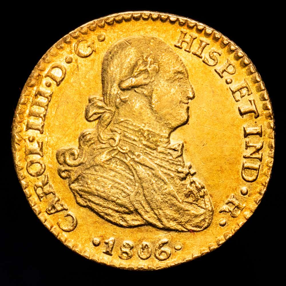Carlos IV (1788-1808). 1 escudo. 1806/5. México. TH. (Cal-1141). Au. 3,37 gramos. Sobrefecha. UNC-. Muy rara. Bello color.