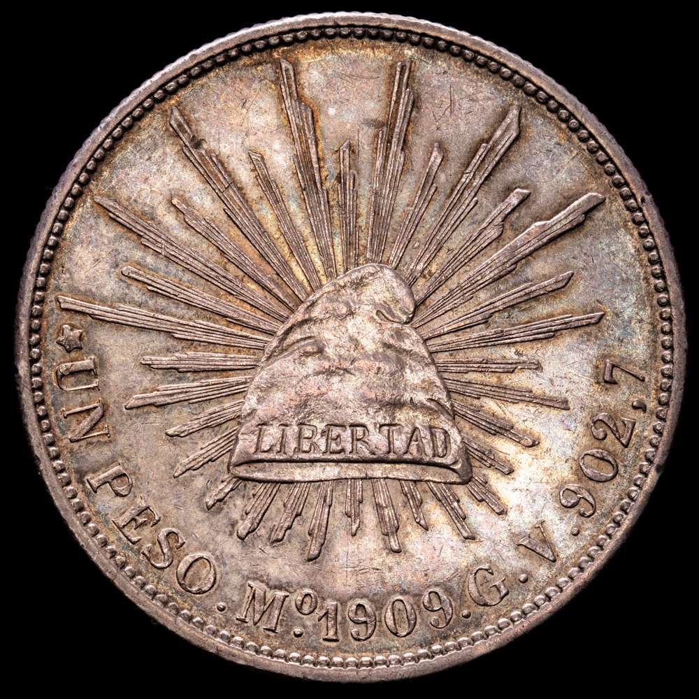 SEGUNDA REPÚBLICA KM-409.2 – Peso 1909 México Mo GV. (27,13 gramos). Bella pátina de monetario antiguo con un ligero brillo subyacente. UNC-.