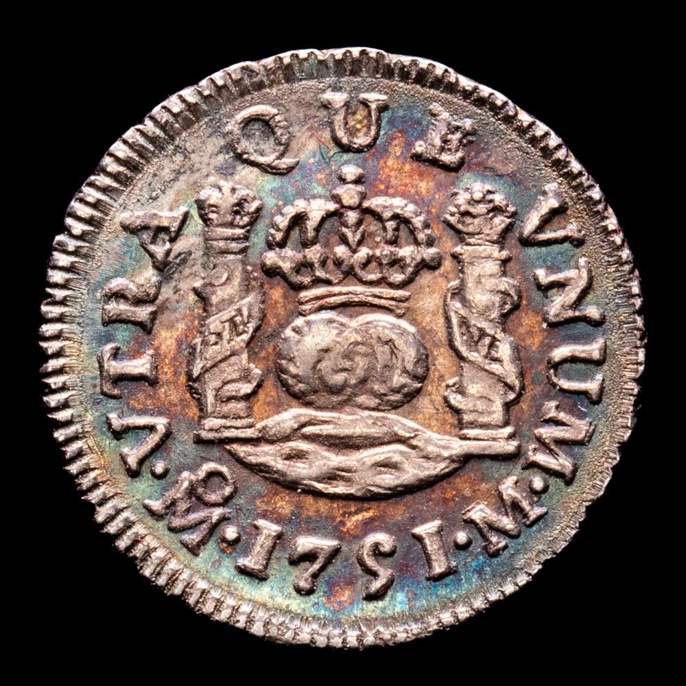 Fernando VI (1746-1759). 1/2 real. 1751. México. M. (Cal-84). Ag. 1,62 gramos. Bonita pátina irisada. Buen ejemplar. Escasa así. EBC.
