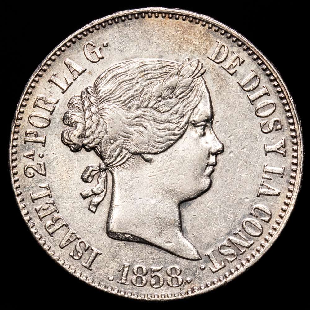 Isabel II (1833-1868). 10 reales. 1858. Madrid. (Cal-535). Ag. 12,89 g. Limpiado. Escaso. MBC+.