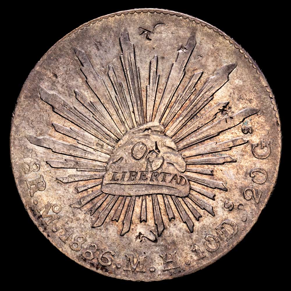 México. 8 reales. 1886. México. MH. (Km-377,10). Ag. 26,93 gramos. Resellos orientales. MBC.