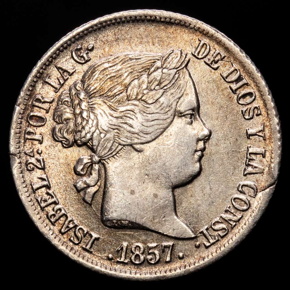 Isabel II (1833-1868). 2 reales. 1857. Barcelona. (Cal-348). Ag. 2,61 gramos. Defecto de acuñación en el canto. Escasa. MBC+.