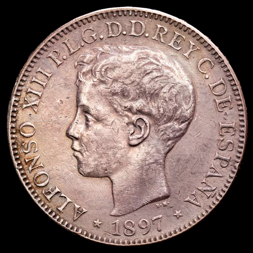 Alfonso XIII (1886-1931). 1 Peso. 1897. Manila. SGV. (Cal-122). Ag. 24,69 gramos. Pátina oscura. MBC+.