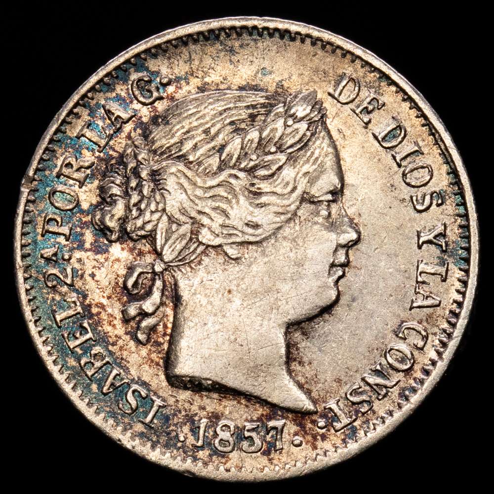 Isabel II (1833-1868). 1 real. 1857. Barcelona. (Cal-280). Ae. 1,29 g. Ligero tono iridiscente en anverso. MBC+.