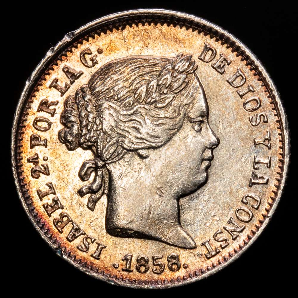 Isabel II (1833-1868). 1 real. 1858/7. Sevilla. (Cal-327). Ag. 1,21 gramos. Clara sobrefecha. Escasa. MBC+ Tono.