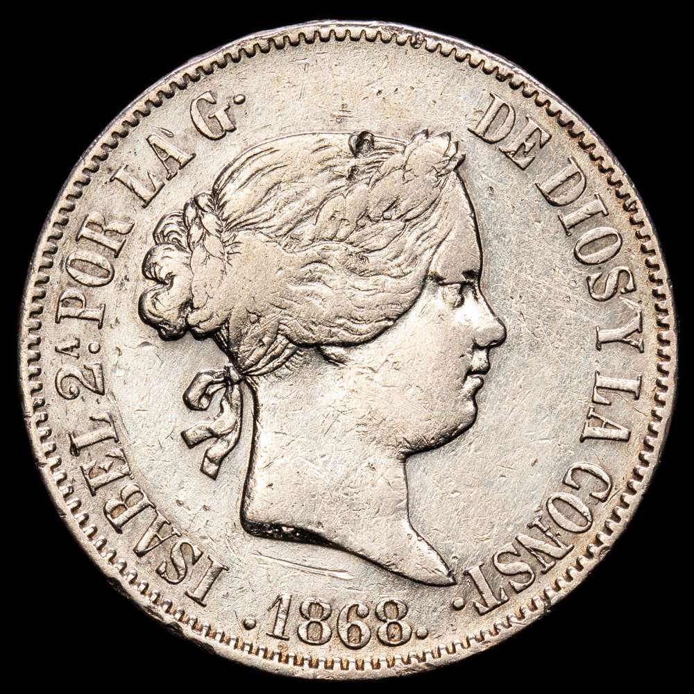 Isabel II (1833-1868). 50 centavos. 1868. Manila. (Cal-667).  Ag. 12,76 gramos. Limpiada. MBC-.