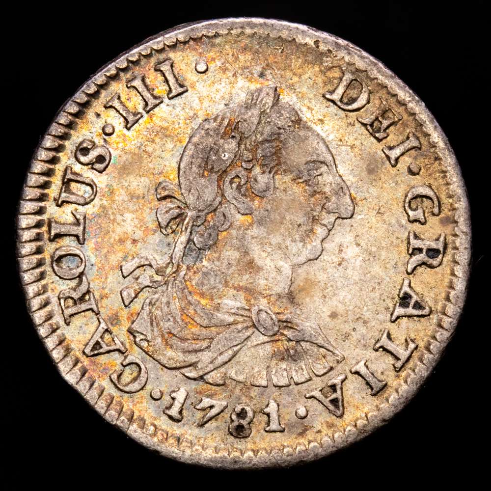 Carlos III (1759-1788). 1/2 real. 1781. México. FF. (Cal-207). Ag. 1,59 g. VF+. Suave pátina.