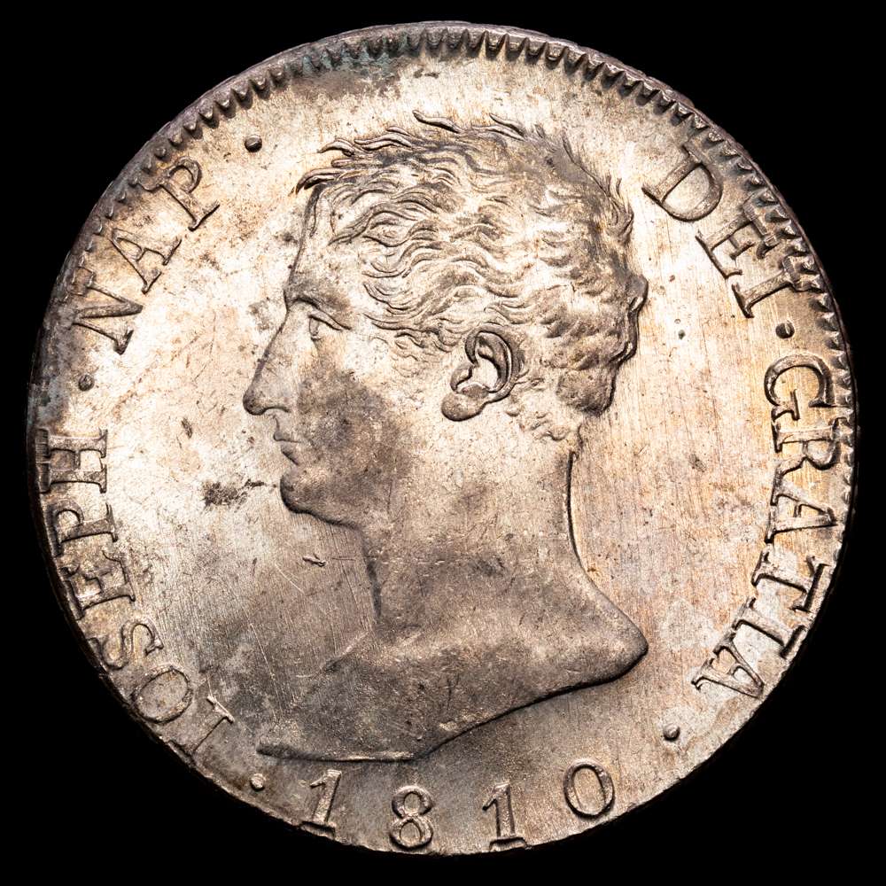 José Napoleón (1808-1814). 20 reales. 1810. Madrid. AI. (Cal-40). 26,95 Gr. Ag. Águila pequeña. Leves concreciones. Pleno brillo original. SC.