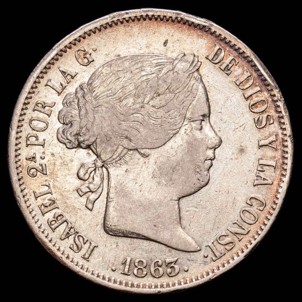 Isabel II (1833-1868). 20 reales. 1863. Madrid. (Cal-621). Ag. 25,86 gramos. Golpecitos en el canto. Escasa. MBC+.