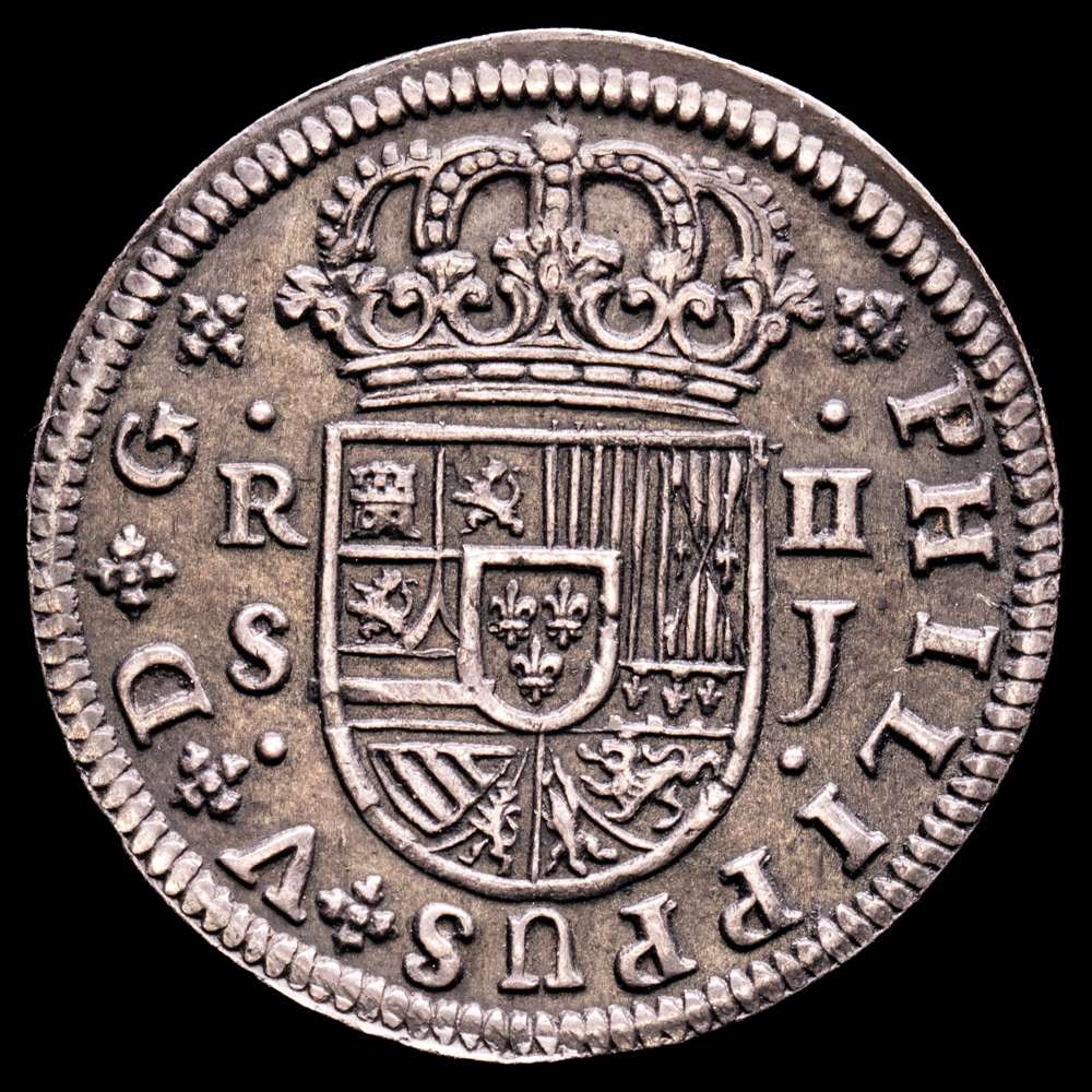 Felipe V (1700-1746). 2 reales. 1722. Sevilla. J. (Cal-980). Ag. 6,13 g. Brillo original. Escasa en esta conservación. EBC. Pátina oscura.