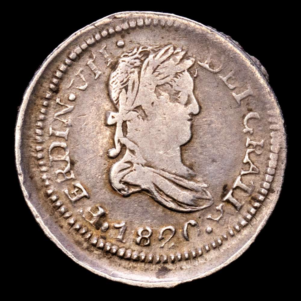Fernando VII (1808-1833). 1/2 real. 1820. Zacatecas. AG. (Cal-494). (Ramírez-ZM.10.1). Ag. 1,63 gramos. Suave pátina. Flan grande. Escasa. BC+/MBC-.